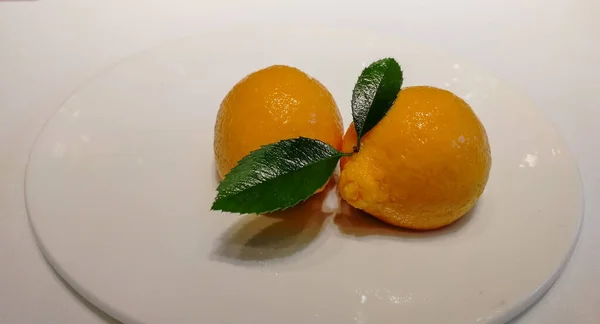 fresh and tasty lemon on white background