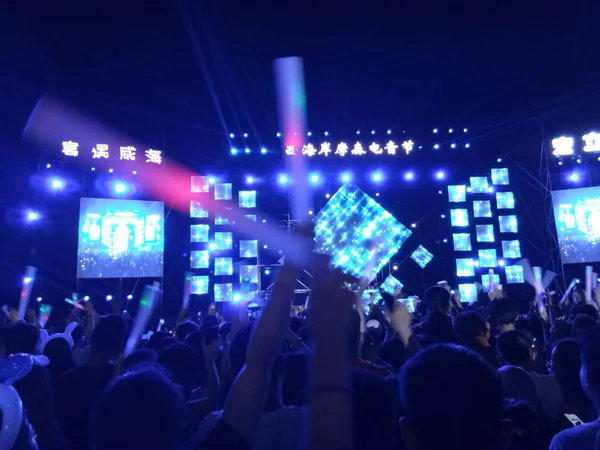 people at the concert. audience at the stage.