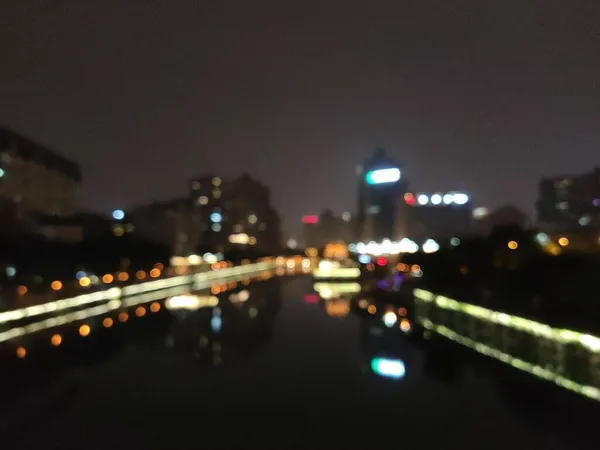 blurred bokeh background of city lights