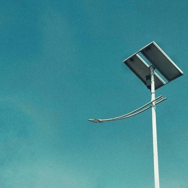 modern electric pole on blue sky background