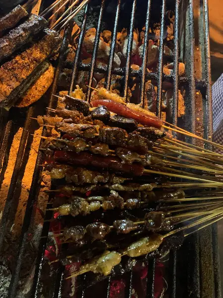 stock image grilled meat and vegetables on the grill