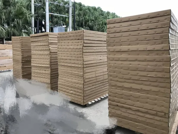 stack of wood pallets in the warehouse