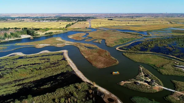 aerial drone view of the river in the forest