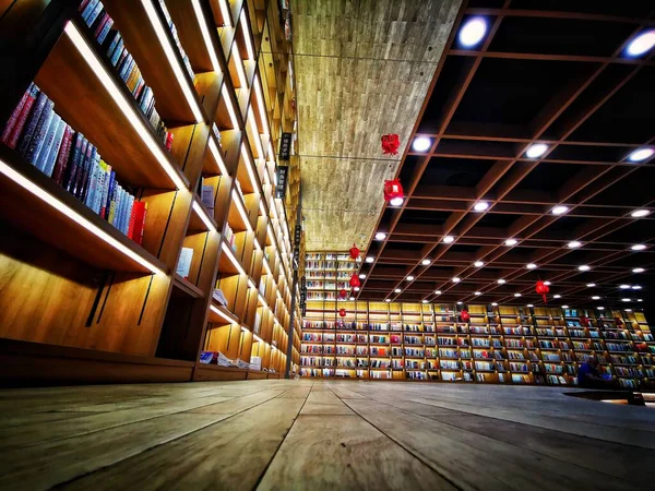 library interior with a wooden bookshelf