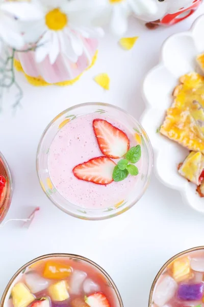 summer drink with strawberries, strawberry and mint