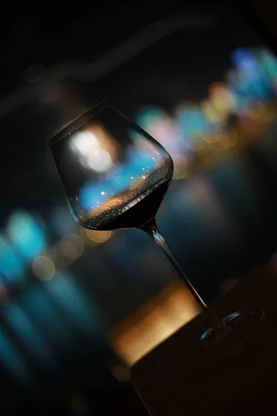 glass of wine on a bar counter