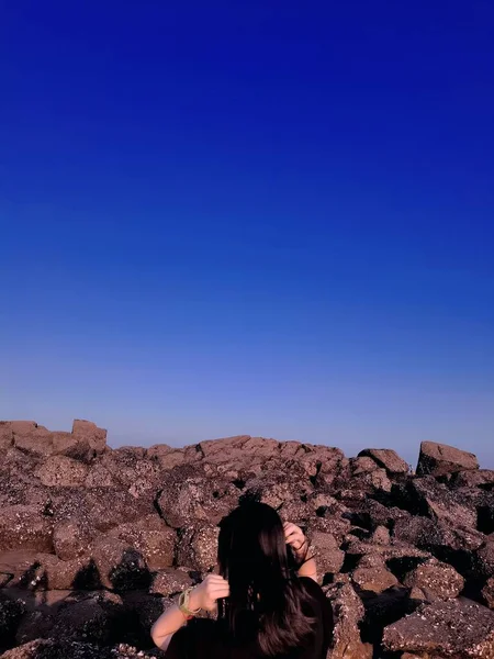 beautiful young woman in a desert