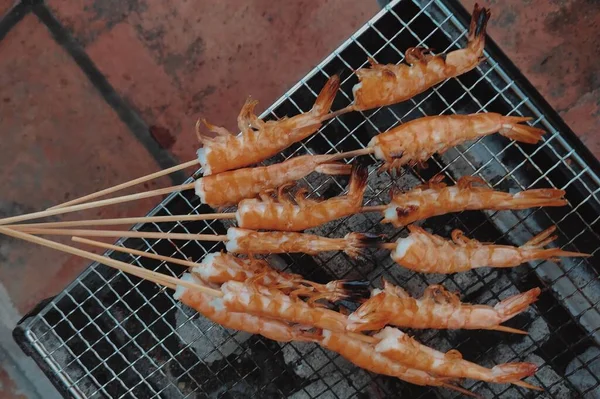 grilled squid on grill.