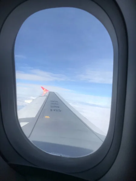 airplane window in the sky