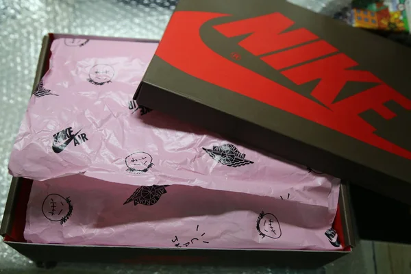 close up of a red velvet box with a gift