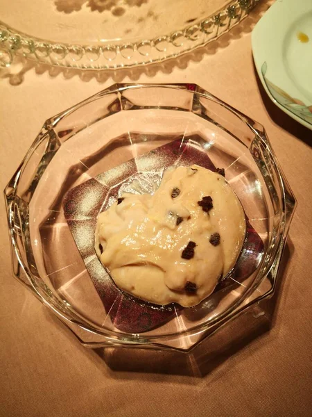 a closeup shot of a delicious cake with a glass of milk