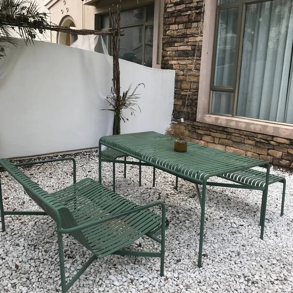 outdoor patio with chair and chairs
