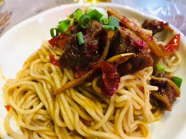 spaghetti with meat and vegetables