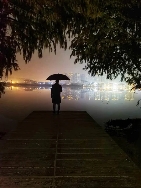 silhouette of a man on the bridge