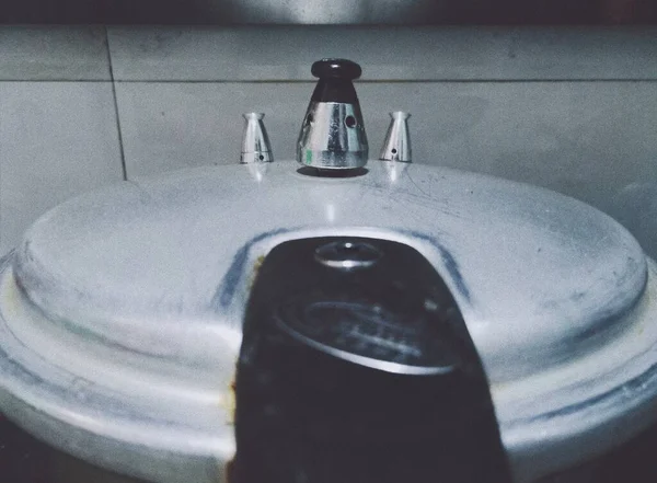 modern bathroom sink with water drops