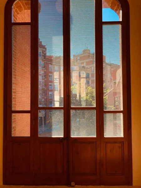 window with windows and wooden shutters