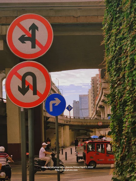 street sign with a lot of people signs