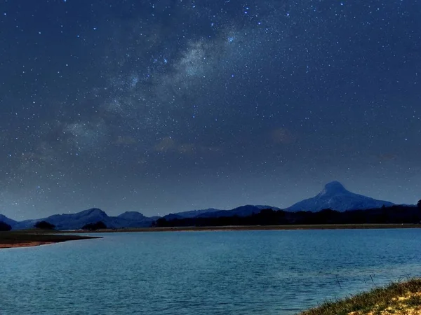 beautiful landscape with a star of the moon in the mountains