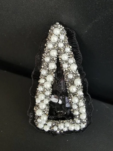 jewelry with diamonds on black background