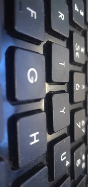 close up of a computer keyboard with a question mark