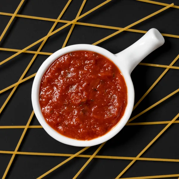 delicious sweet sauce with tomato and basil