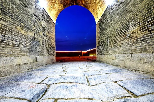 old stone arch in the city of the ancient town of the spanish