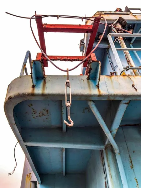 old rusty metal container with a blue sky