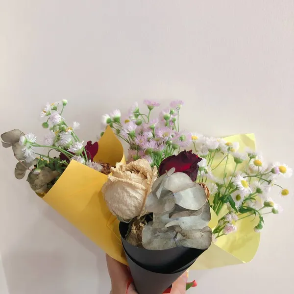 stock image beautiful bouquet of flowers in a vase on a white background