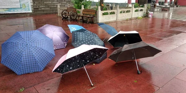 a beautiful shot of a cafe with a large umbrella