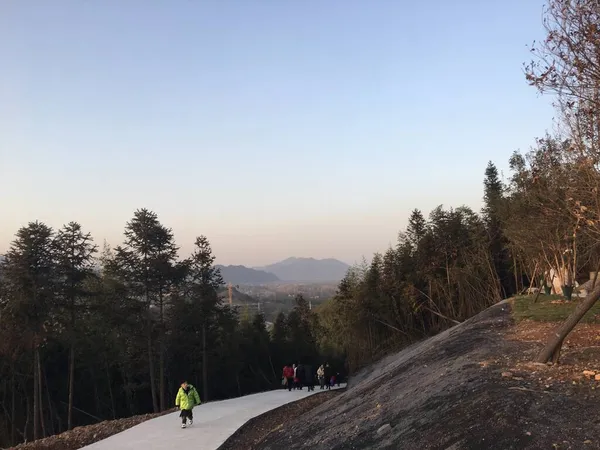 a man and a woman in a mountain landscape