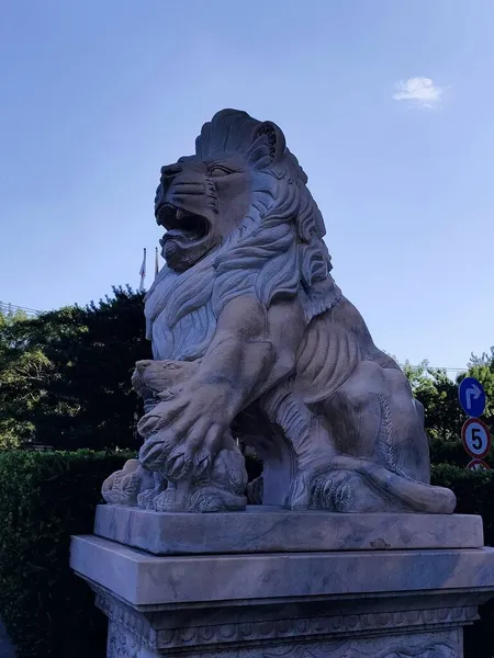 lion statue in the city of barcelona