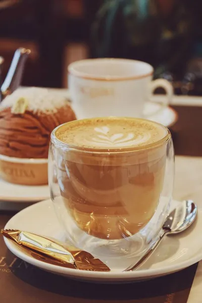 a cup of coffee with a white background