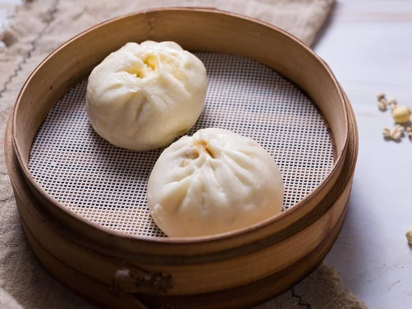 chinese steamed dumpling with egg and cheese
