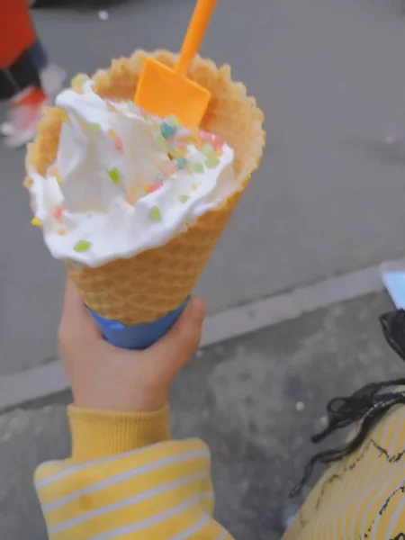 ice cream cone with waffle cones and chocolate on a stick