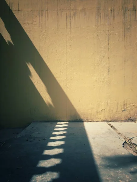 empty concrete wall with shadow