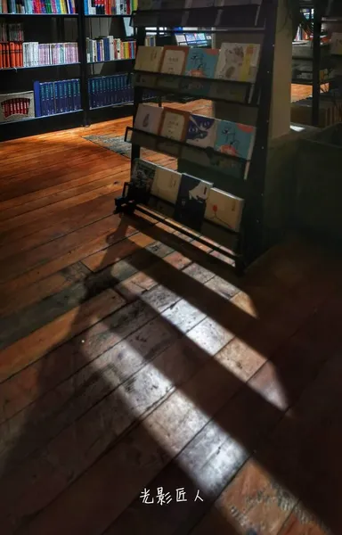 old wooden library interior with a lot of books