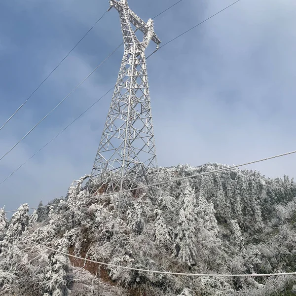 high voltage power lines in the snow