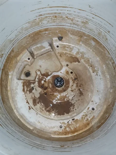 close up of a dirty water tap