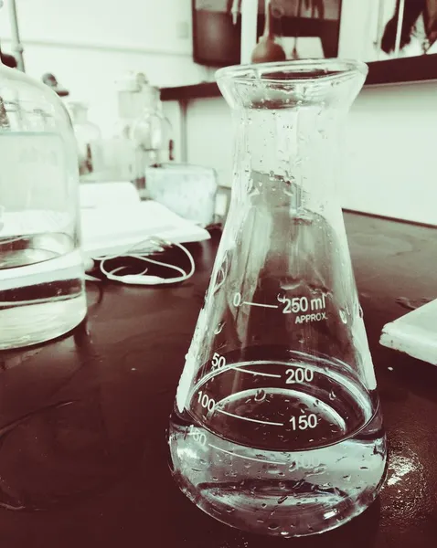 laboratory glassware with liquid and chemical liquids