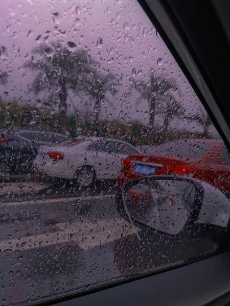 car window with rain drops