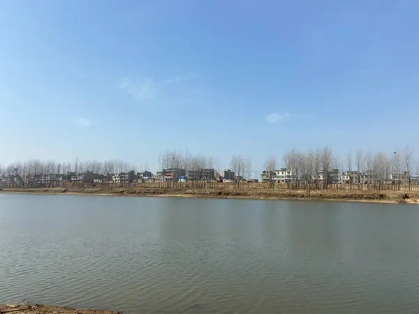 stock image beautiful landscape with a river and a lake