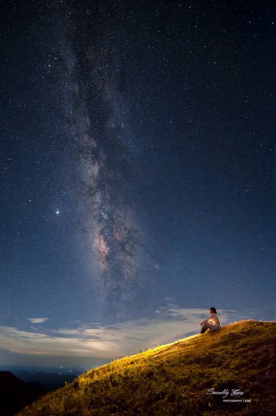 milky way on the mountain in the night sky
