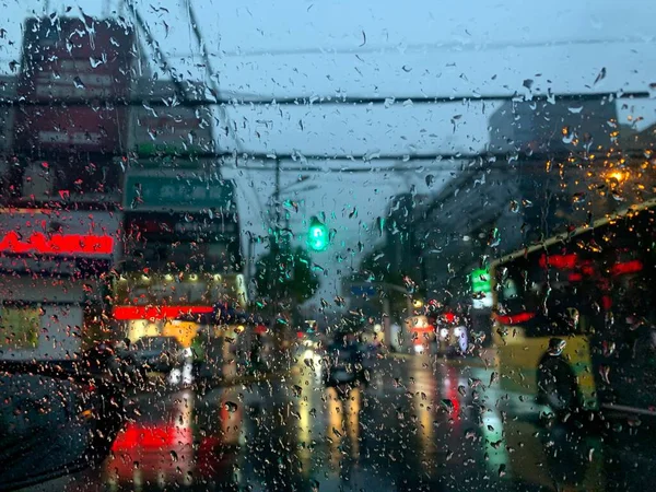 rainy weather, rain drops on the street