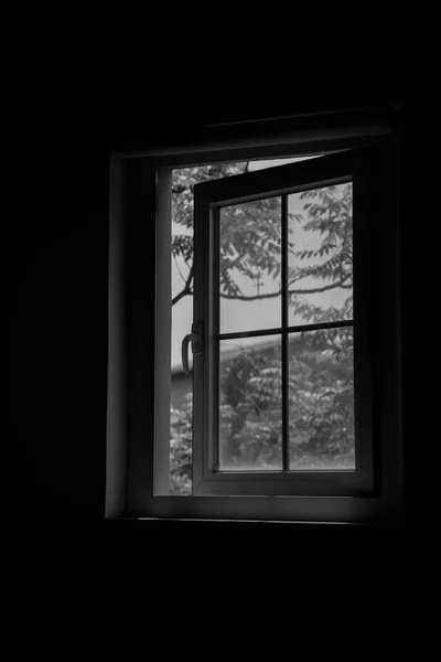 window with a white curtain