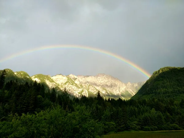 beautiful landscape with a rainbow in the mountains