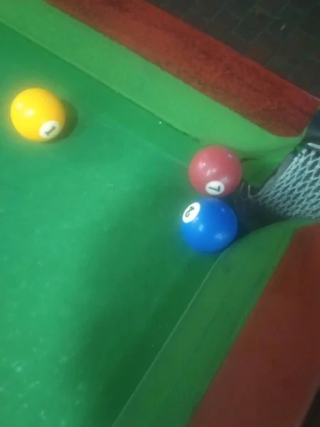 pool ball with green balls