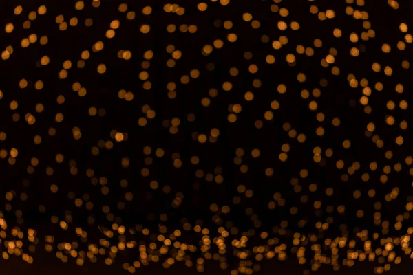 Простая Фоновая Праздничная Концепция Черного Фона Желтых Несфокусированных Огней Гирлянды — стоковое фото