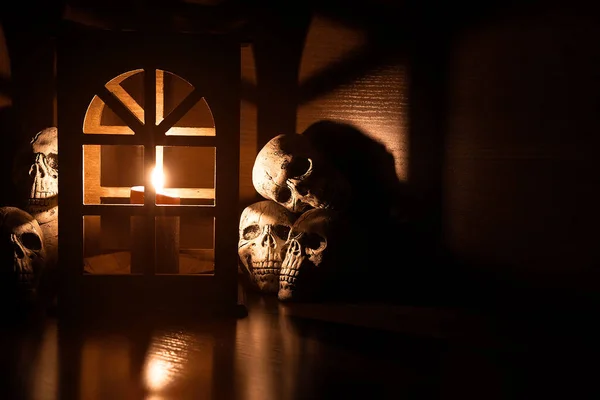 Dark Dungeon Decoration Table Vintage Lantern Candle Light Human Skulls — Stock Photo, Image