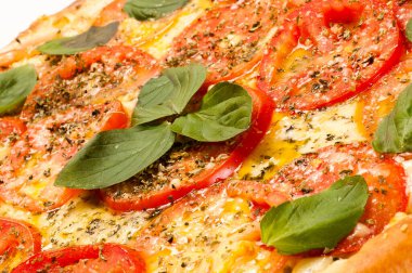 Pizza, dünyanın en çok tüketilen yiyeceklerinden biri, çok sayıda çeşidi ve çeşidi var, lezzetli, tatlı, fırında kızartılmış, vs..
