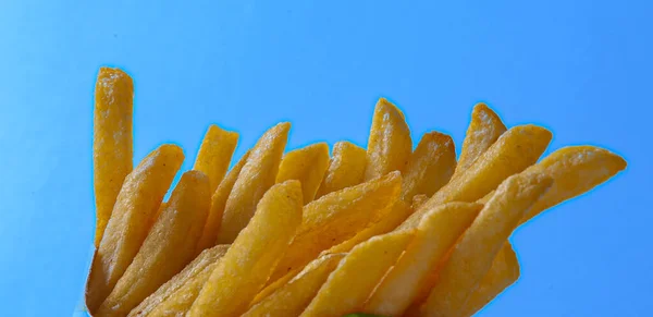 Crispy French Fries Blue Background — Zdjęcie stockowe